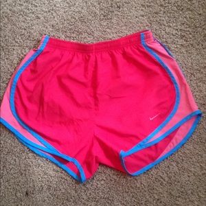 Red Nike shorts